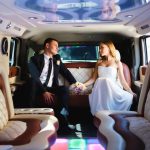 Newlyweds in a car